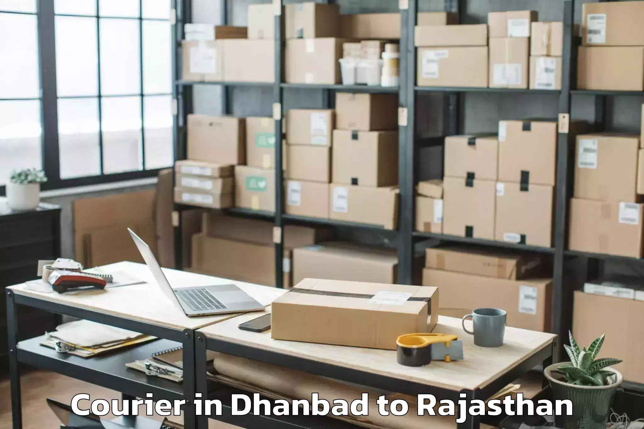 Book Dhanbad to Gangapur Bhilwara Courier Online